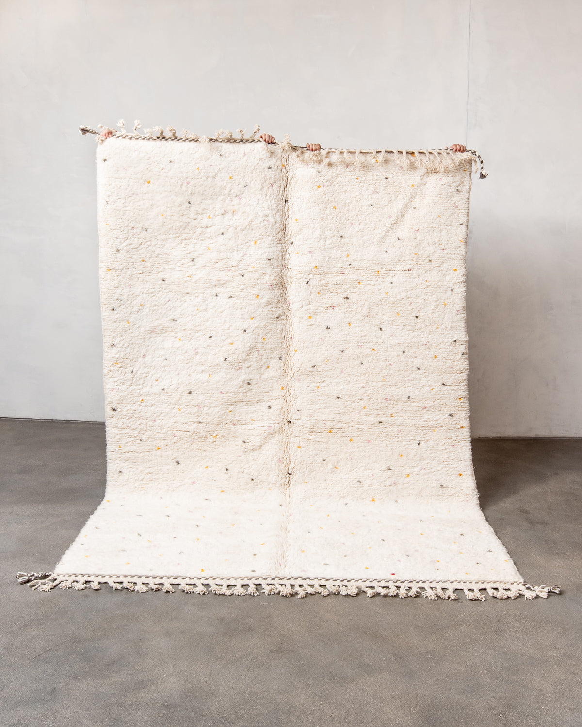 Modern, designer, handcrafted Berber rug from Morocco. Beniourain carpet with beautiful colours and patterns and fluffy wool texture.
